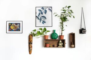 Assorted home décor pieces arranged neatly, including vases, candles, and decorative items, showcasing style and warmth for a cozy home.