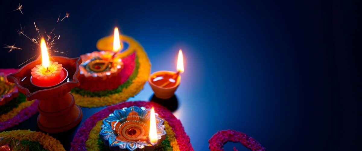A vibrant Deepawali scene featuring lit diyas, colorful rangoli, and festive decorations, capturing the warmth and joy of the festival of lights.