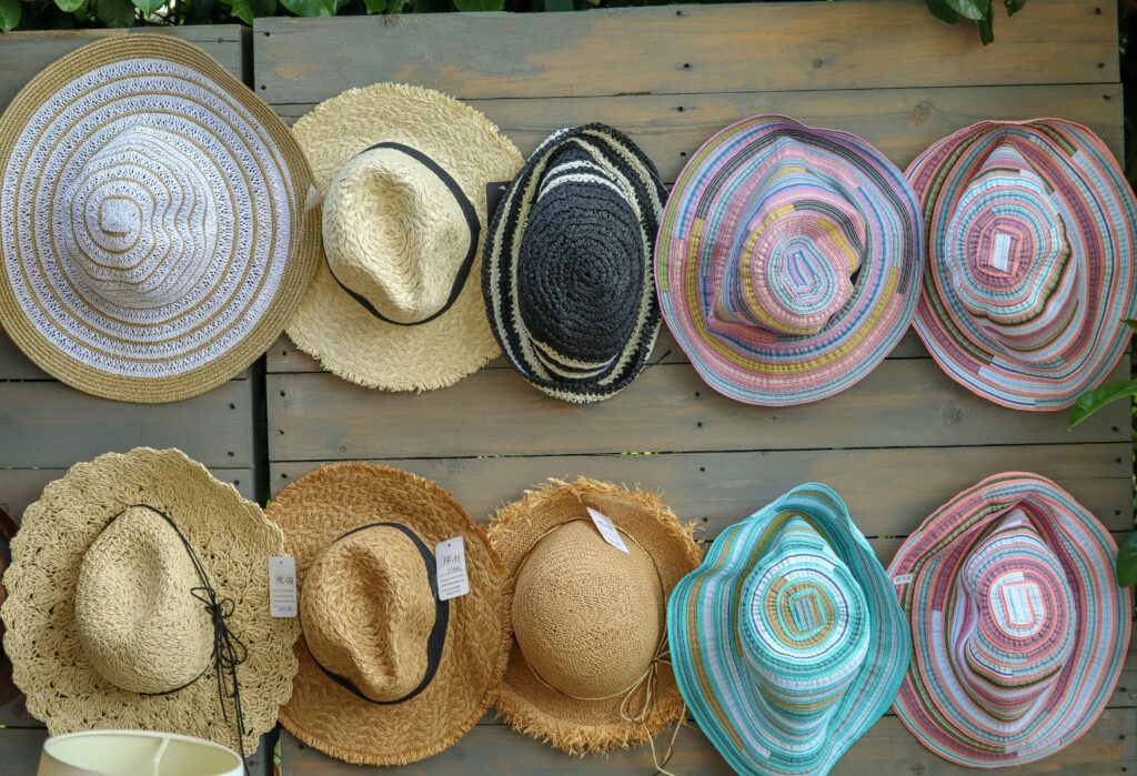 "Wide brim straw sun hat blocking 80% UV rays summer essentials"