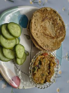 Serving homemade matar kulcha in a plate with fresh cucumber slices — light oil-free Indian street food recipe